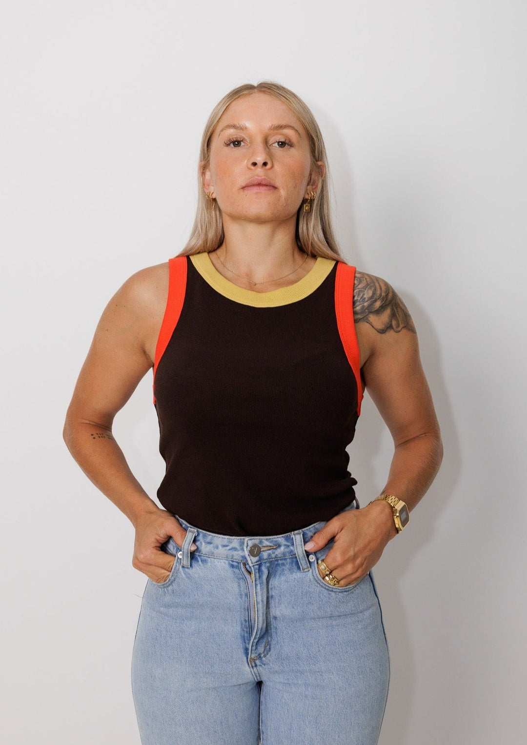 Clothing The Gaps. Blak Summer Rib Tank. Ribbed tank/ singlet has a retro washed Black base with retro washed red around the sleeves and a retro washed lighter yellow around the neckline. 