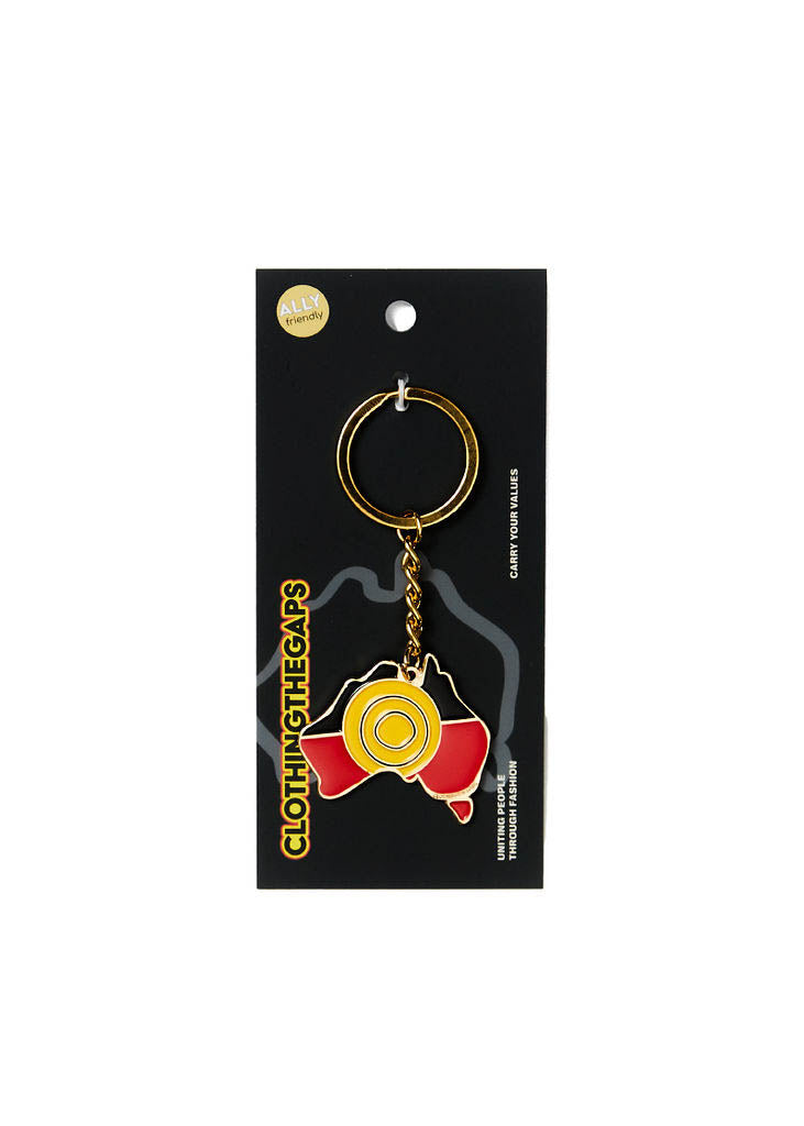 Clothing The Gaps. Keyring with gold chain and loop attached to black, yellow and red aboriginal flag colours shaped inside map of Australia with skinny gold outline.