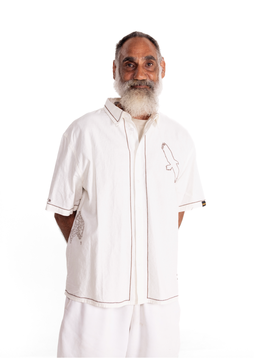 Man wearing a white clothing the gaps spirit shirt on a white background