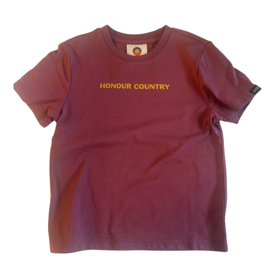 Clothing The Gaps. Kids Plum Honour Country Tee. Plum pinky purple t-shirt with screen printed mustard yellow bold capital text 'Honour and respect Aboriginal and Torres Strait Islander people as the rightful custodians of country.' The word 'Honour country' on the front in the same text and contrasting colour.