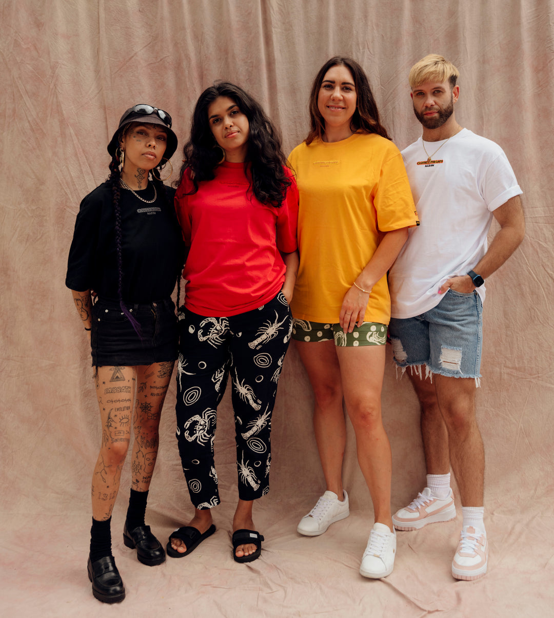 Clothing The Gaps. Sun Tee. Yellow T-shirt. With embroidered 'Clothing The Gaps' on front chest with minimalist font in a contrasting light yellow colour and 'Narrm' in a darker yellow embroidered underneath, acknowledging the land on which Clothing The Gaps operates it's social enterprise.