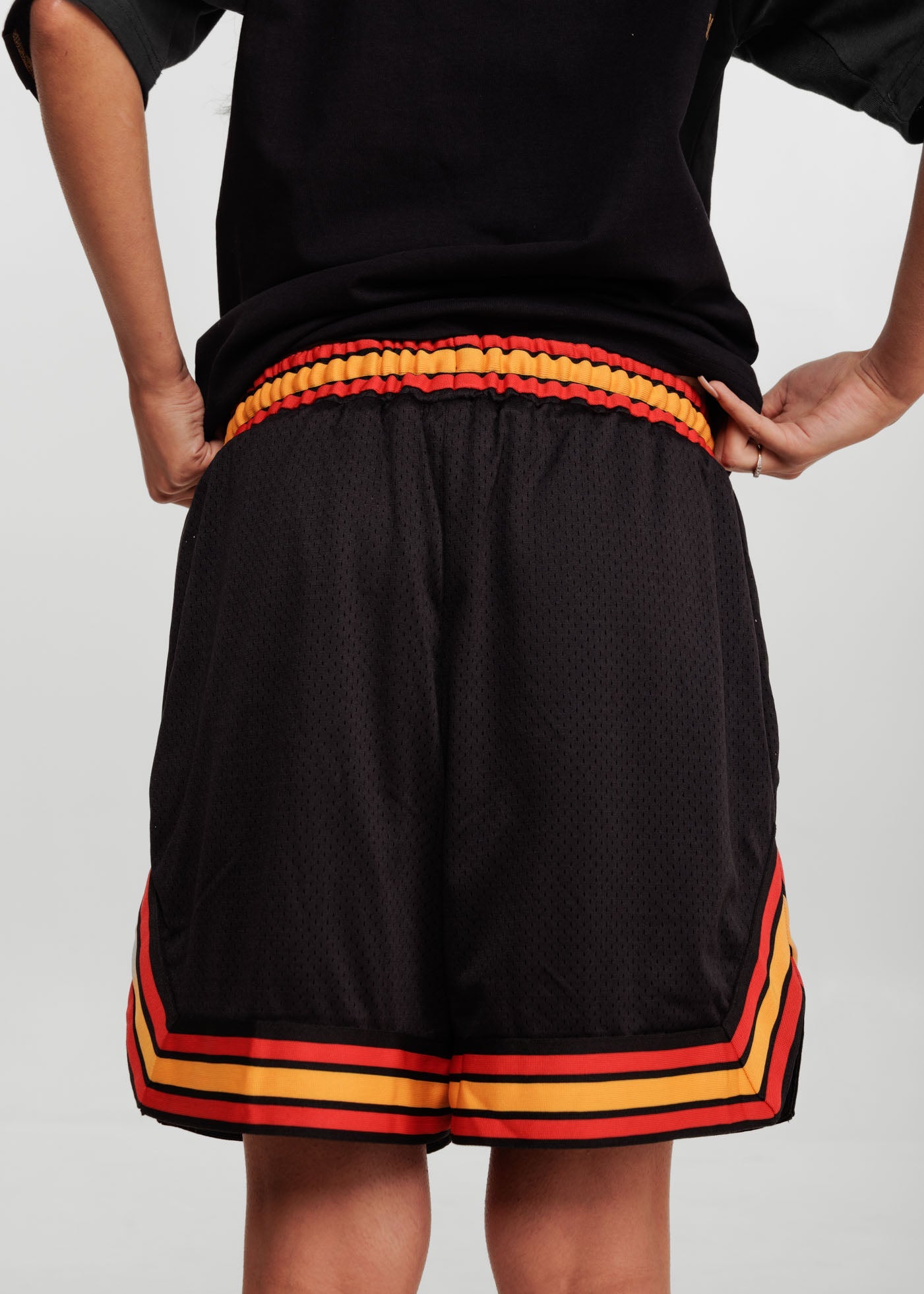 red and yellow basketball shorts