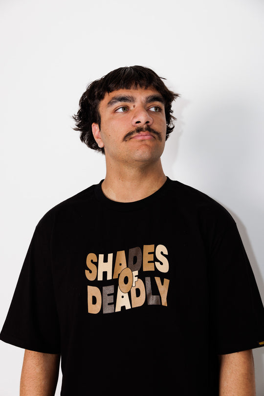 Clothing The Gaps. Shades of Deadly. Mob only T-shirt. Black T-shirt with 'Shades of Deadly' Screen printed on the front chest area with letters in different shades of brown and tan colours. 