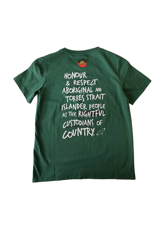 Clothing The Gaps. Kids Handwritten Honour Country Tee. Forrest green T-shirt with 'Honour Country' across chest in handwritten white text and coloured Aboriginal flag small underneath. On Back of tee white hand-writen style text 'Honour and respect Aboriginal and Torres Strait Islander people as the rightful custodians of country.' Circling 'respect' underlining 'custodians' and highlighting 'rightful' in a black colour. Outlined 'bunjil' eagle in bottom right corner.'        