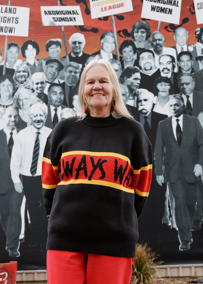 Power knit jumper in Aboriginal flag colours. Clothing The Gaps.