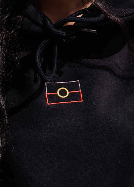 Close up embroidered Aboriginal flag on hoodie chest