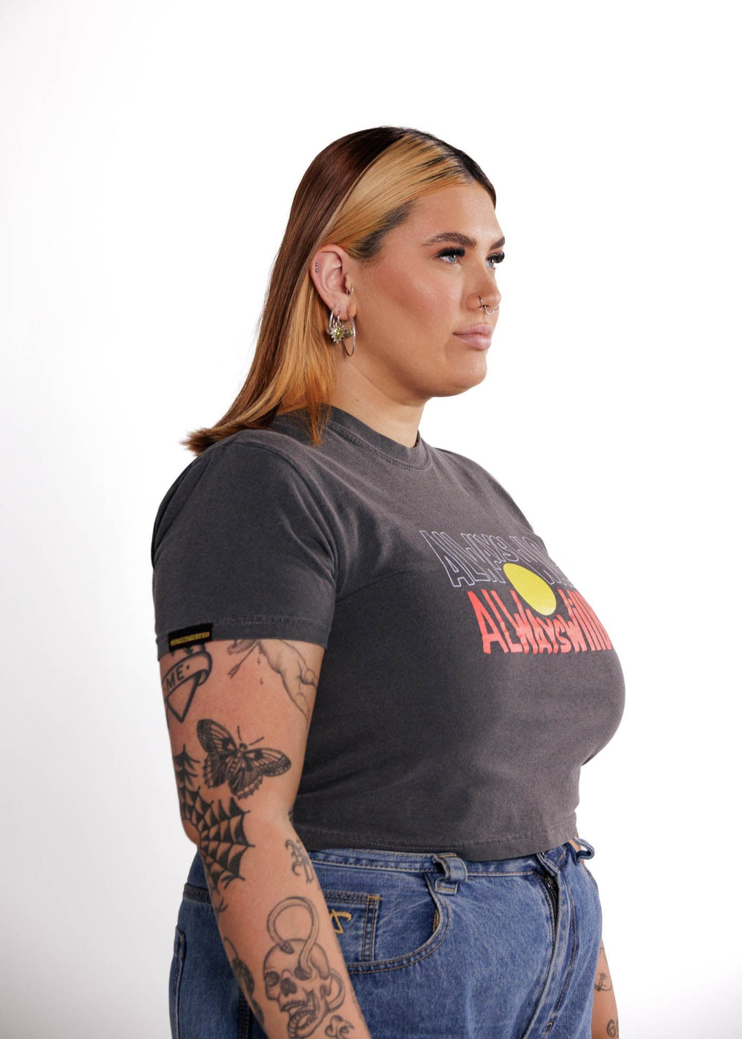 Clothing The Gaps. Aboriginal Flag Vintage Crop Always Was Always Will Be Tee. Washed Grey cropped t-shirt with Black, yellow and red 'always was always will be' text screen printed in centre.