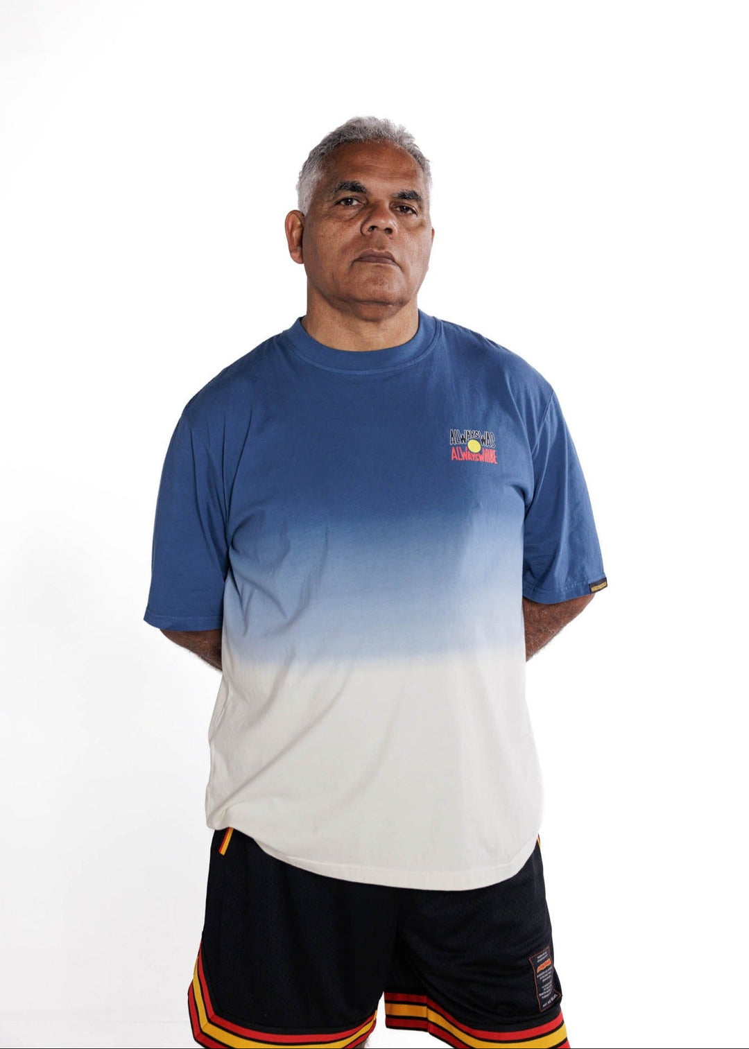 Clothing The Gaps. Blak Basketball Shorts. Retro look with red, black and yellow stripes around bottom of shorts, on pocket opening and around waist band. Rest of the shorts are a black mesh material. Has a elastic waist, black drawstrings, deep pockets and clothing the gaps patch on corner of left leg.