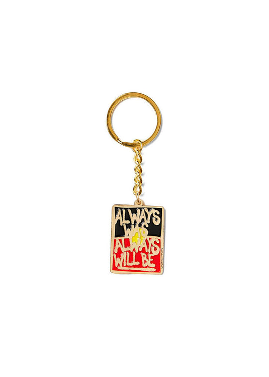 Clothing The Gaps. Keyring with gold chain and loop attached to rectangle shaped Black, yellow and red 'always was always will be' text outlined in gold.