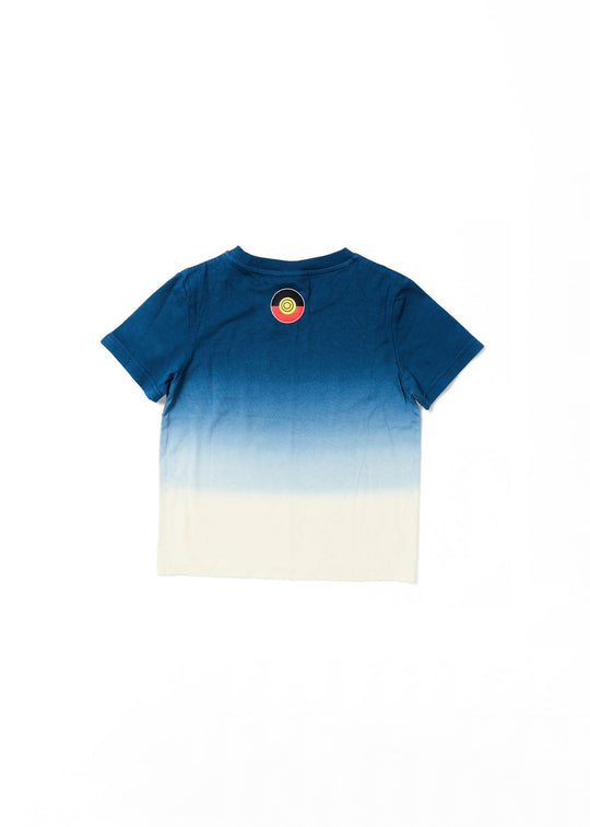 Clothing The Gaps. Kids Dip Dye 'Always Was, Always Will Be' Tee. Blue died t-shirt that fades down from the top of t-shirt to lighter blues then a cream white. With a Black, yellow and red 'always was always will be' text screen printed in left corner pocket sized.