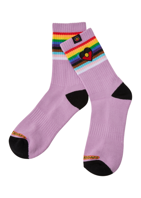 Purple socks with rainbow stripes and black accents on a white background