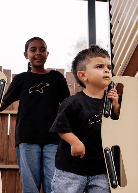 Clothing The Gaps Kids Bunjil Icon Tee Black — Bunjil Kulin Nation Aboriginal Flag Decolonised Map Wear Your Values Aboriginal Owned Melbourne
