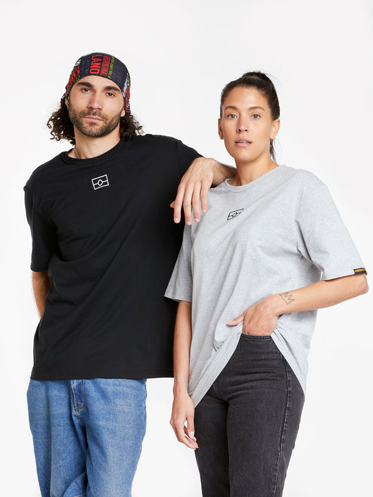 Clothing The Gaps. Values Tee. Black T-shirt with White outline of Aboriginal flag embroidered small on chest and on back of t-shirt 'wear your values' small embroidered in white.
