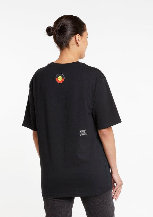 Clothing The Gaps. Values Tee. Black T-shirt with White outline of Aboriginal flag embroidered small on chest and on back of t-shirt 'wear your values' small embroidered in white.