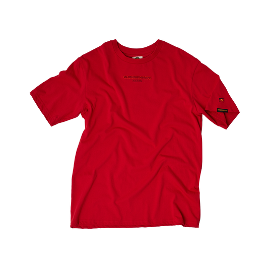 Clothing The Gaps. Land Tee. Red T-shirt. With embroidered 'Clothing The Gaps' on front chest with minimalist font in a contrasting light red colour and 'Narrm' in a dark red embroidered underneath, acknowledging the land on which Clothing The Gaps operates it's social enterprise.