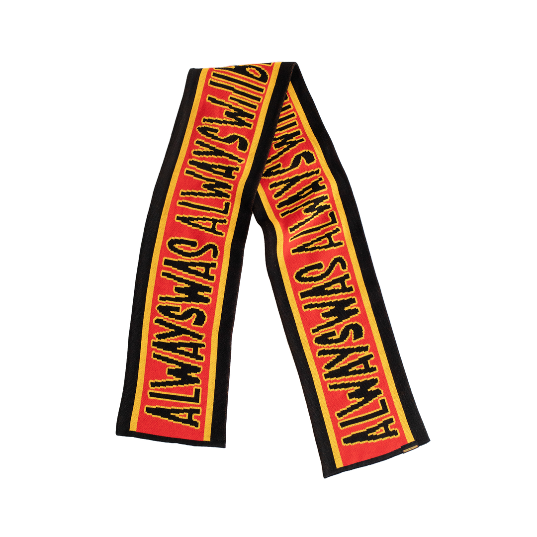 Clothing The Gaps. Power Scarf. High quality thick scarf with black bold text with a yellow outline reading 'always was always will be.' Text is on a red background with a yellow thin line then thick black trim. 
