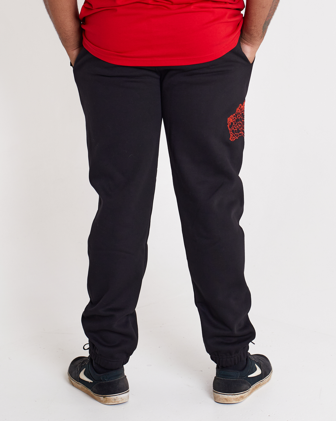 Knee cut track pants on sale