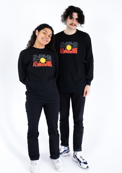 Clothing The Gaps. Aboriginal Tee Black long sleeve T-shirt with Black, yellow and red 'always was always will be' text screen printed in centre. Aboriginal Flaf