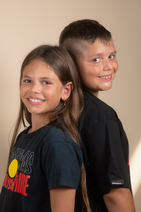 Clothing The Gaps. Aboriginal  Black kids short sleeve T-shirt tee with Black, yellow and red 'always was always will be' text screen printed in centre.