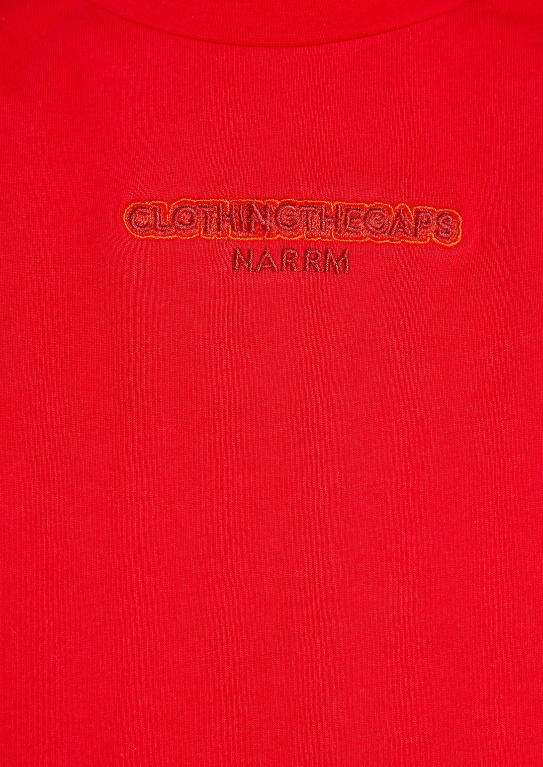 Clothing The Gaps. Land Tee. Red T-shirt. With embroidered 'Clothing The Gaps' on front chest with minimalist font in a contrasting light red colour and 'Narrm' in a dark red embroidered underneath, acknowledging the land on which Clothing The Gaps operates it's social enterprise.